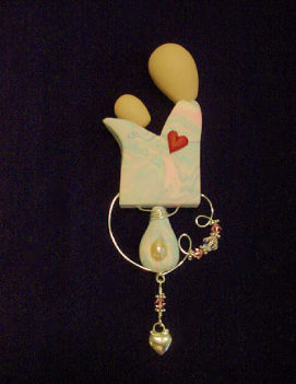 Mother and Child Pin- Handmade with Polymer Clay and Sterling Silver wire, findings and heart charm. Austrian Crystals are also used. Bar pin on the back. Jewelry box included. Unique and Beautiful for a Mother's Day Gift! Unique design, one-of-a-kind! 100% handmade!